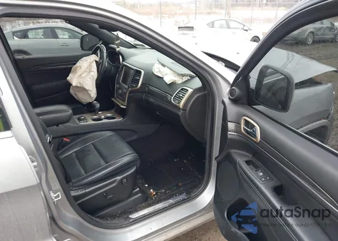 2014 Jeep Grand Cherokee Overland z USA, uszkodzony, nr VIN 1C4RJFCG6EC402398